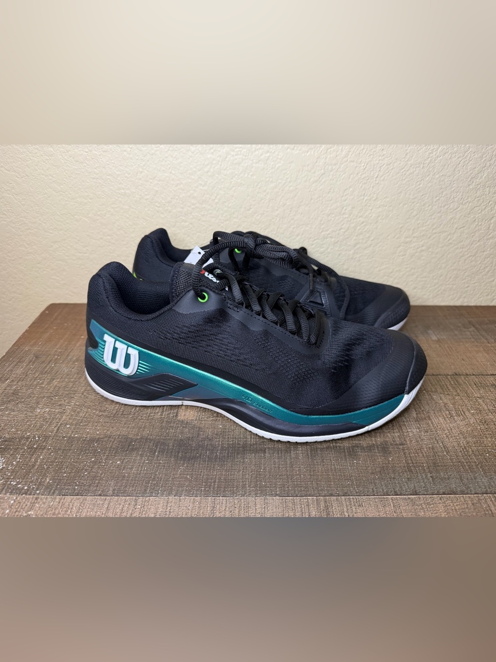 Wilson Rush Pro 4.0 Blade OrthoLite Black Tennis Shoes. 
- Size 9 Men.